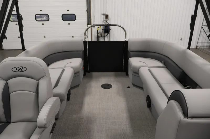 Slide: The Image of 2026 Bentley Pontoons 223 Bolt Tri-Toon interior with luxurious gray seating and spacious layout. - 26
