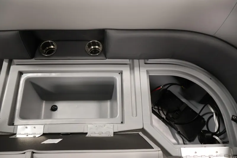 Slide: The Image of 2026 Bentley Pontoons 223 Bolt Tri-Toon interior storage and cup holders. - 31