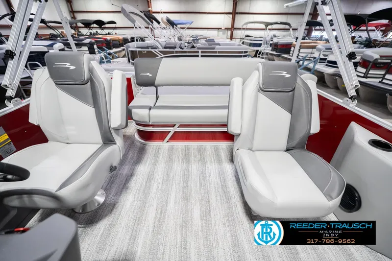 Slide: The Image of Interior of 2026 Bennington 20 SSR pontoon boat with gray and white seating. - 17