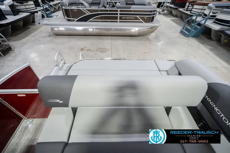 Slide: The Image of 2026 Bennington 20 SSR pontoon boat interior with seating, displayed at Reeder Trausch Marine. - 18