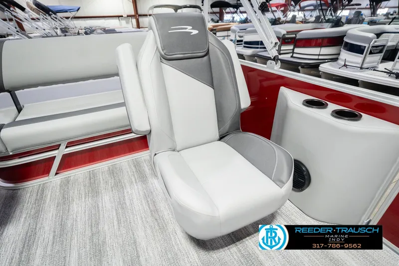 Slide: The Image of 2026 Bennington 20 SSR boat interior with gray seating and cup holders. - 24