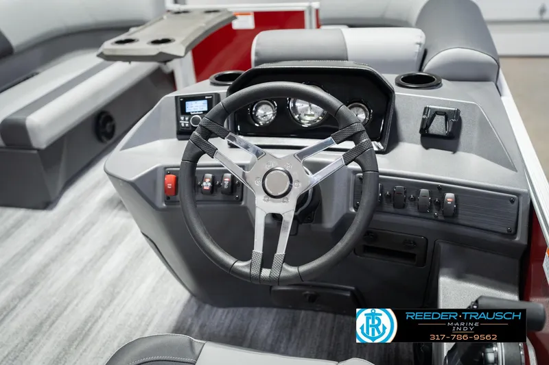 Slide: The Image of 2026 Bennington 20 SSR boat dashboard with steering wheel and control panel. - 28