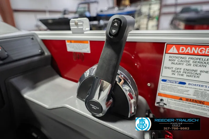 Slide: The Image of Throttle control of 2026 Bennington 20 SSR boat with safety warnings and dealership logo. - 36