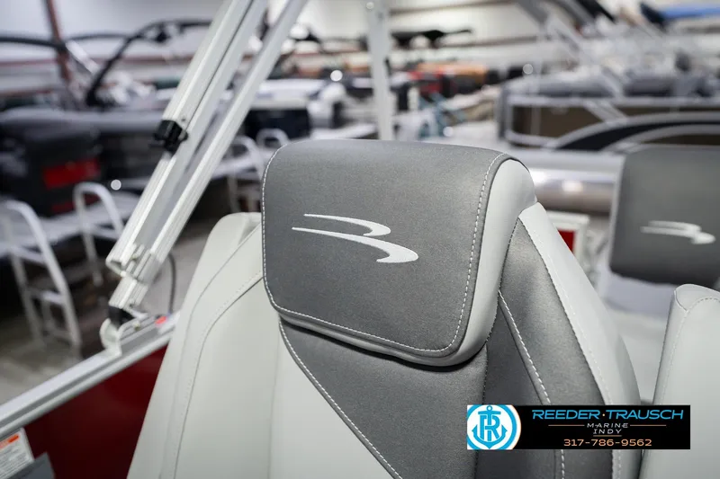 Slide: The Image of 2026 Bennington 20 SSR boat seat with logo in showroom setting. - 38