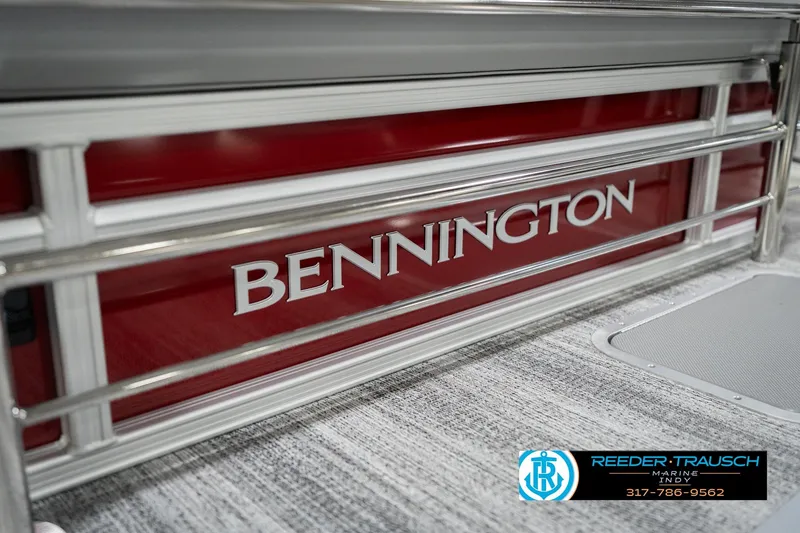 Slide: The Image of 2026 Bennington 20 SSR boat with red paneling and silver railing. - 55
