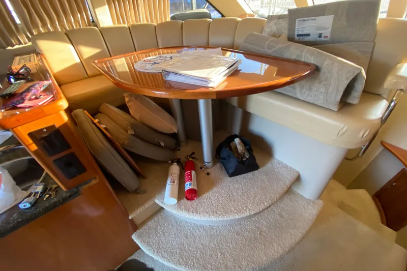 Slide: The Image of Helm of 2005 Carver 38 Super Sport with Raymarine electronics and dual throttle controls. - 11