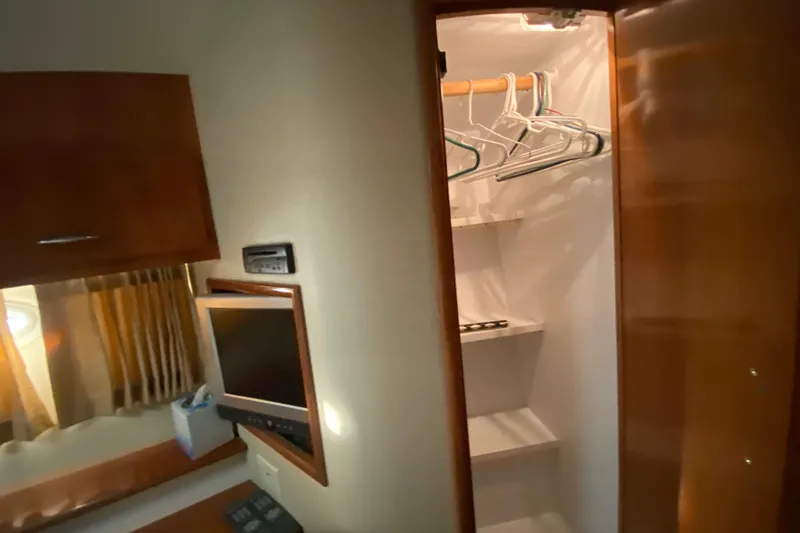 Slide: The Image of Control panel of a 2005 Carver 38 Super Sport boat with labeled switches. - 15