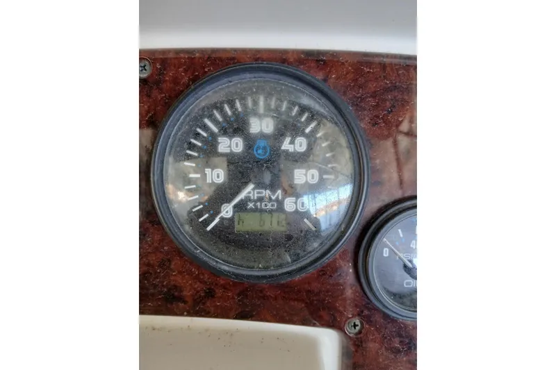 Slide: The Image of Close-up of Volvo Penta engine cover on 2005 Carver 38 Super Sport. - 40