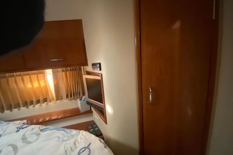 Slide: The Image of Close-up of RPM gauge on 2005 Carver 38 Super Sport boat dashboard. - 14