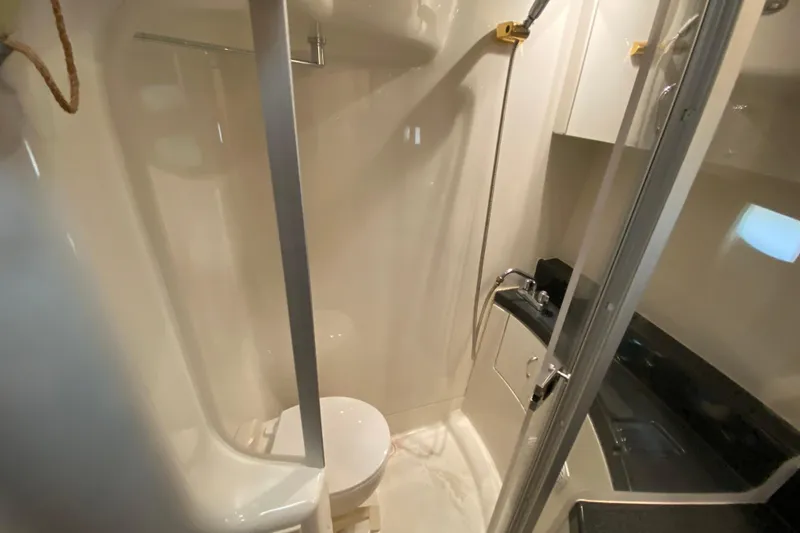 Slide: The Image of Interior of 2005 Carver 38 Super Sport yacht with kitchen and entertainment area. - 20