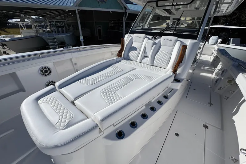 Slide: The Image of 2026 Caymas 44 CT luxury boat interior with plush seating and modern design. - 18