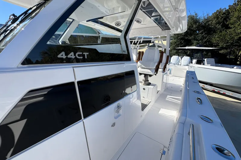 Slide: The Image of 2026 Caymas 44 CT boat interior with sleek design and modern seating. - 20