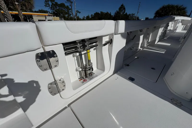 Slide: The Image of 2026 Caymas 44 CT boat interior, showcasing sleek white seating and stainless steel hardware. - 39