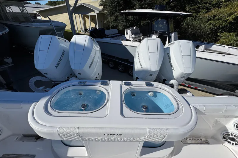 Slide: The Image of 2026 Caymas 44 CT boat with Mercury engines and dual livewells. - 42