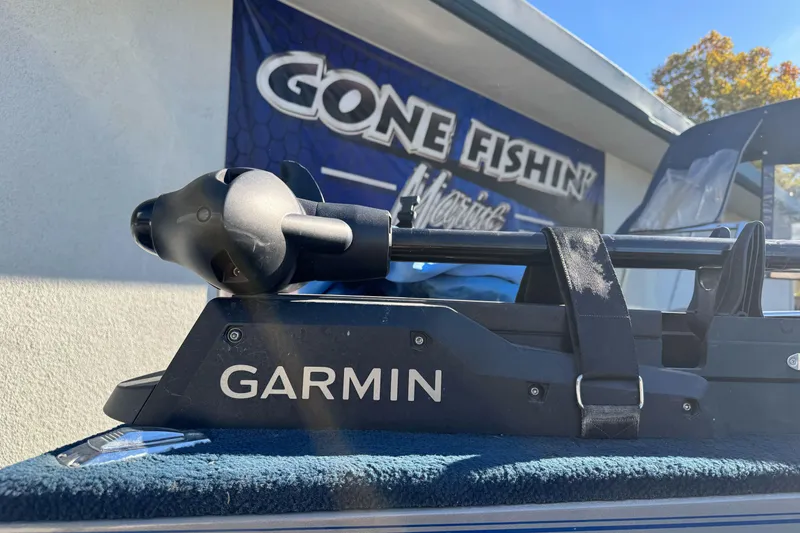 Slide: The Image of Garmin device on 2001 Lund 1700 Pro Sport boat, "Gone Fishin'" sign in background. - 3