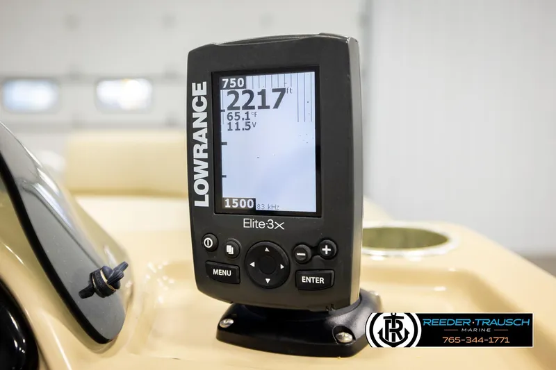 Slide: The Image of Fishfinder display on a 2015 Lowe SS 210 boat dashboard. - 29