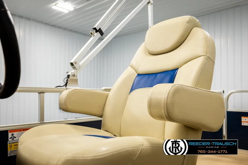Slide: The Image of Luxurious beige and blue captain's chair on 2015 Lowe SS 210 boat. - 33
