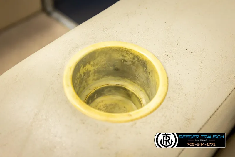 Slide: The Image of Close-up of a cup holder on a 2015 Lowe SS 210 boat. - 39