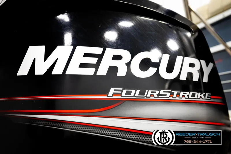 Slide: The Image of Mercury FourStroke engine on 2015 Lowe SS 210 boat, Reeder Trausch Marine branding. - 41