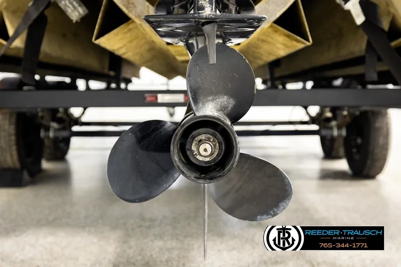 Slide: The Image of Close-up of a 2015 Lowe SS 210 boat propeller on a trailer. - 43