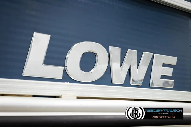 Slide: The Image of 2015 Lowe SS 210 boat logo with Reeder-Trausch Marine branding. - 46