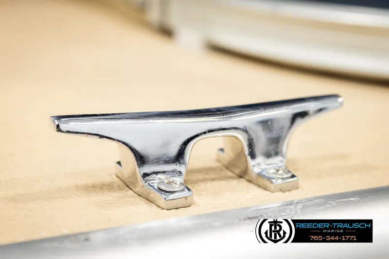 Slide: The Image of Chrome boat cleat on a 2015 Lowe SS 210, Reeder-Trausch Marine branding visible. - 48