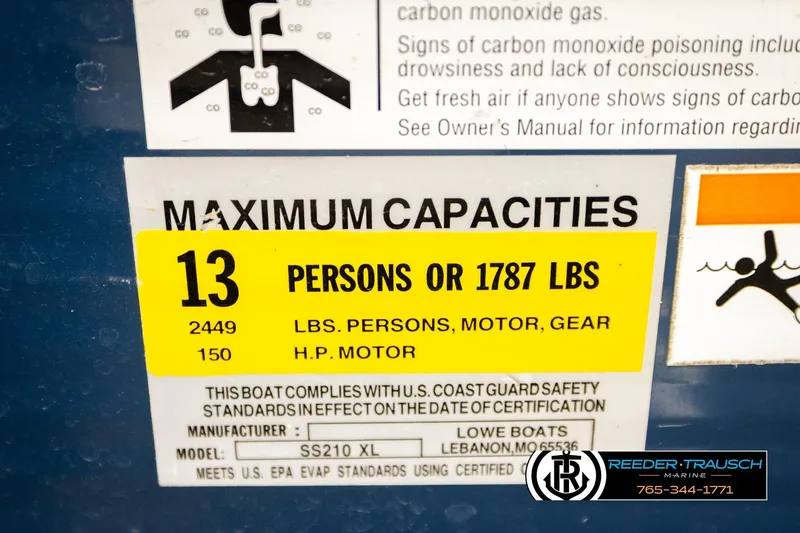 Slide: The Image of 2015 Lowe SS 210 capacity label: 13 persons or 1787 lbs, 150 HP motor. - 49