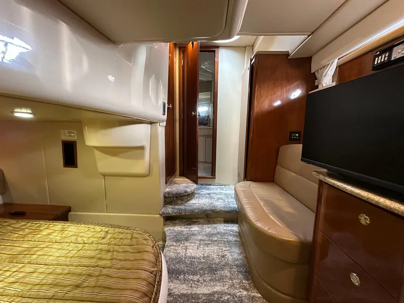 Slide: The Image of Interior of 2007 Meridian 411 Sedan yacht with cozy seating and modern amenities. - 15
