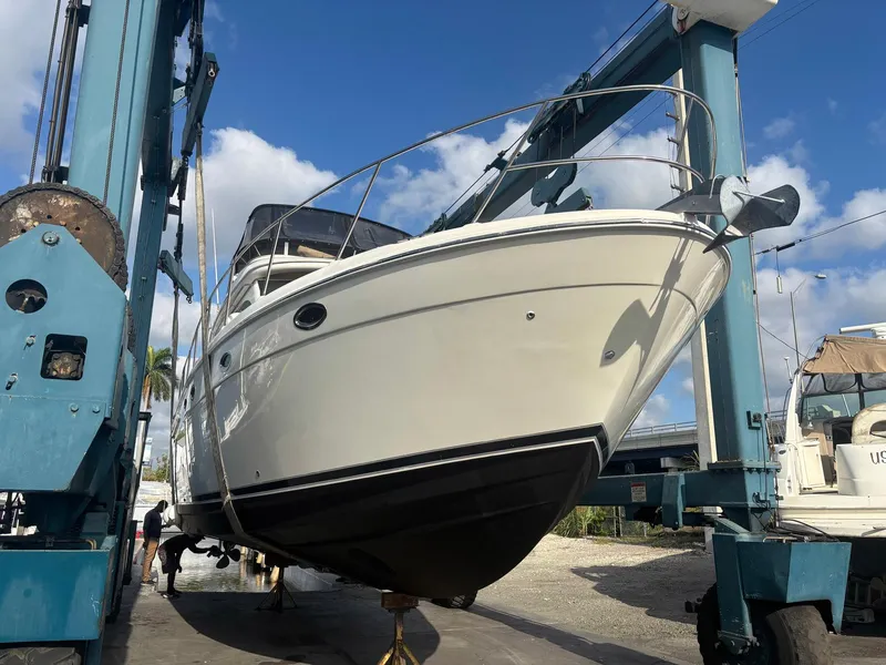 Slide: The Image of 2007 Meridian 411 Sedan yacht in dry dock, viewed from the bow. - 4