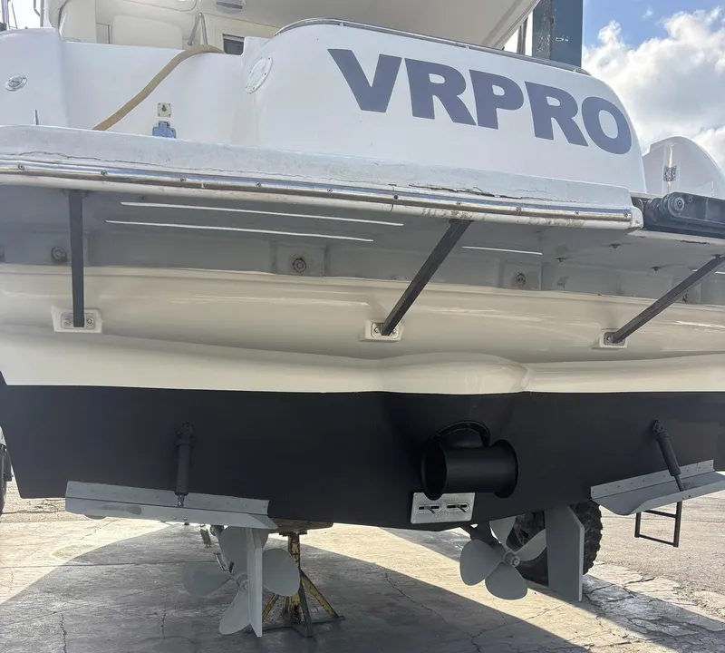 Slide: The Image of Rear view of a 2007 Meridian 411 Sedan boat with "VRPRO" lettering. - 6