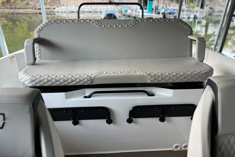 Slide: The Image of 2025 Navan S-30 boat interior with quilted seating and modern design. - 10