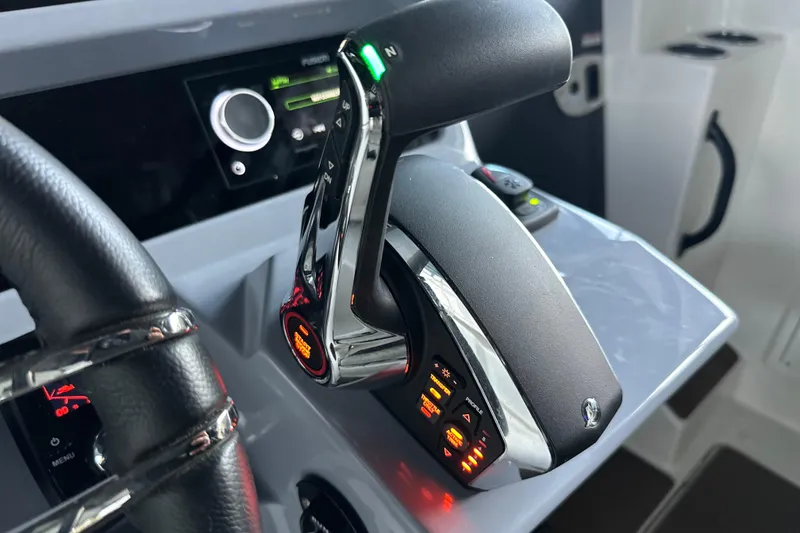 Slide: The Image of Control panel of 2025 Navan S-30 boat with advanced throttle system. - 19