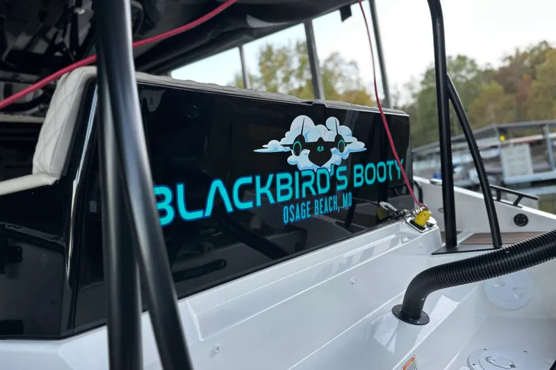 Slide: The Image of Navan S-30 boat, "Blackbird's Booty," docked at Osage Beach, MO, 2025 model. - 24