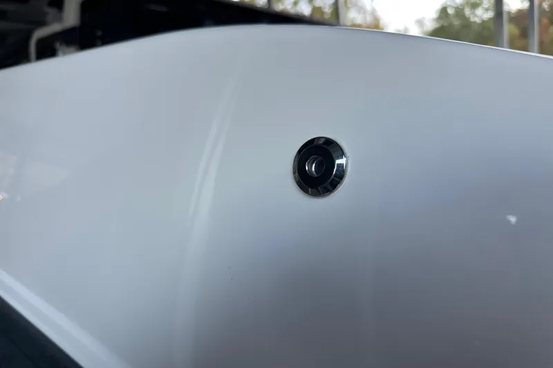 Slide: The Image of Close-up of 2025 Navan S-30 vehicle sensor on white exterior. - 26