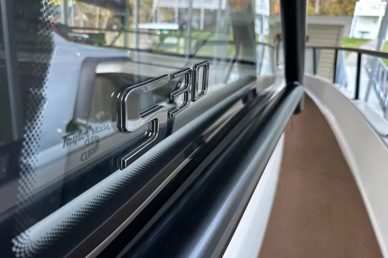 Slide: The Image of 2025 Navan S-30 boat with sleek design and modern detailing. - 30