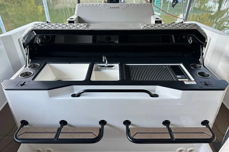 Slide: The Image of Outdoor kitchen setup on 2025 Navan S-30 boat with sink and grill. - 31