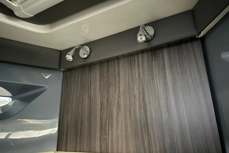 Slide: The Image of Interior of 2025 Navan S-30 with modern wood paneling and sleek lighting fixtures. - 38