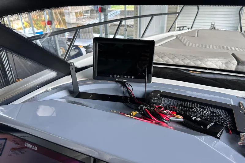 Slide: The Image of Interior of 2025 Navan S-30 boat with dashboard electronics and display screen. - 44