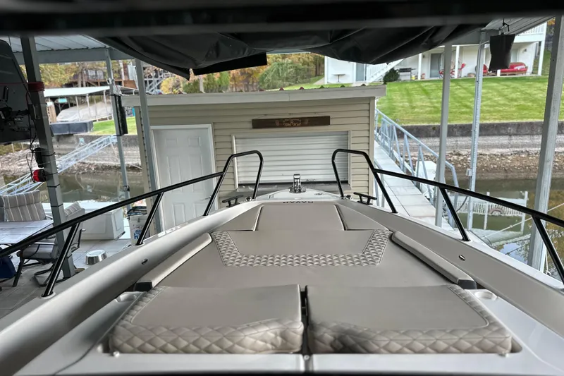 Slide: The Image of Navan S-30 boat docked, showcasing sleek design and modern features, 2025 model. - 7