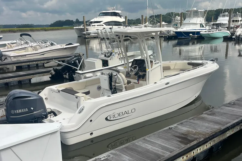 The Image of 2021 Robolo 242EX boat docked at marina with Yamaha engine. - 0