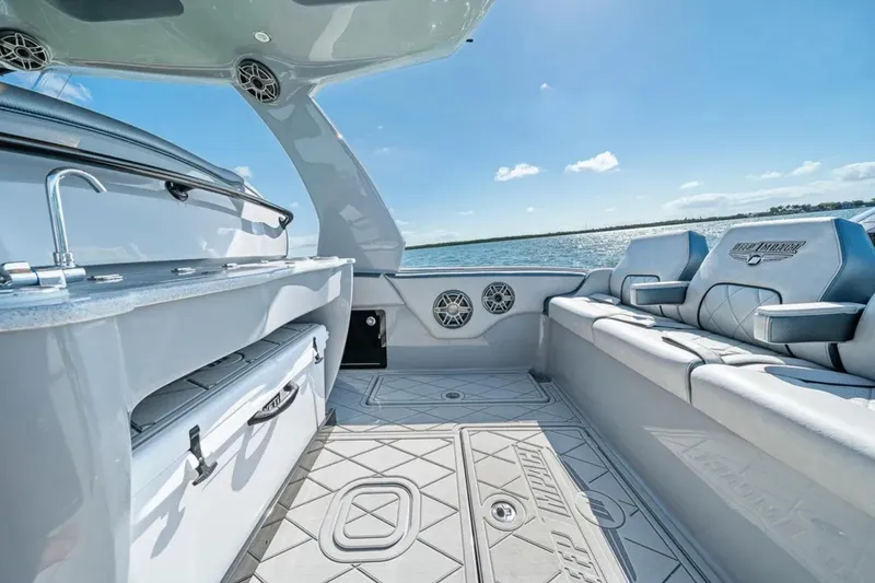Slide: The Image of Luxurious interior of 2025 Deep Impact 369 Sport boat with seating and ocean view. - 41