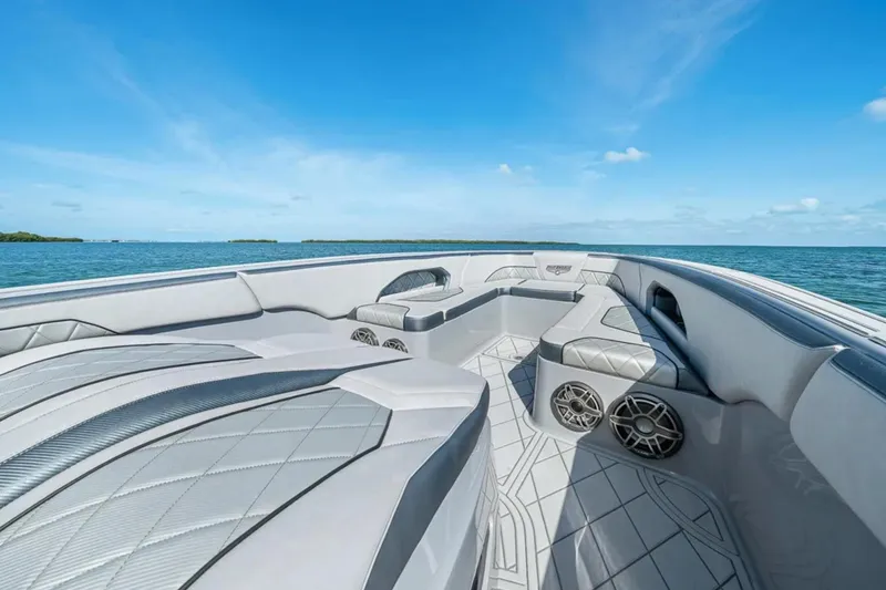 Slide: The Image of Luxury interior of 2025 Deep Impact 369 Sport boat on open water. - 9
