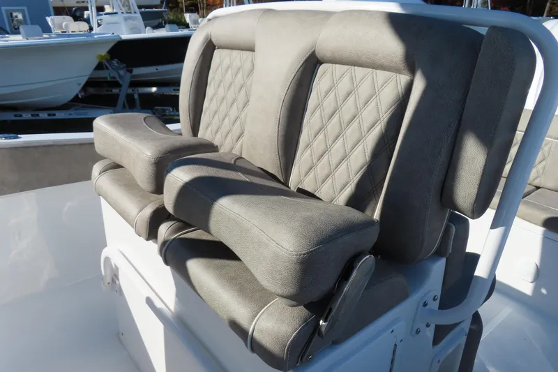 Slide: The Image of 2025 Sea Hunt Ultra 245 SE boat seat with diamond-stitched upholstery. - 21