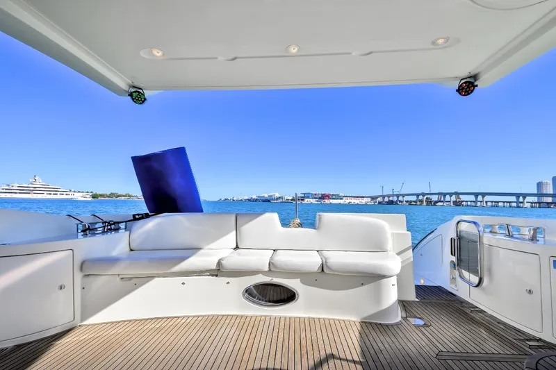 Slide: The Image of Luxurious 2006 Azimut Fly yacht deck with white seating and ocean view. - 5
