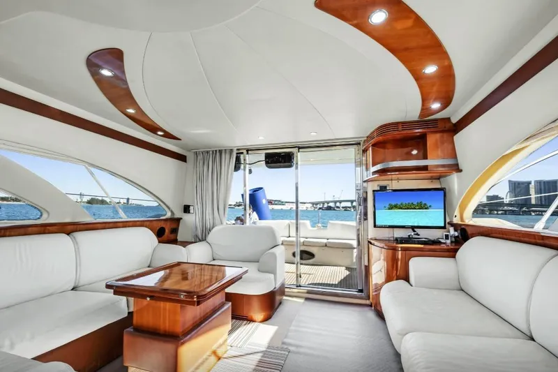Slide: The Image of Luxurious 2006 Azimut Fly yacht interior with elegant wood accents and plush white seating. - 6