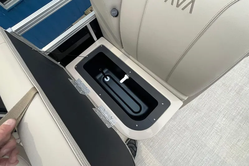 Slide: The Image of Open storage compartment in 2026 Avalon VTX Quad Fish boat seat. - 12
