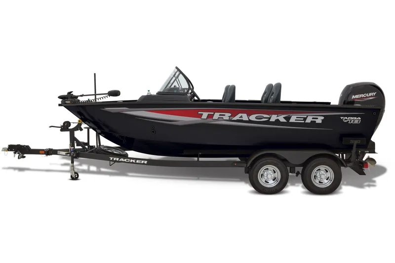 Slide: The Image of Interior of 2026 Tracker Targa V-18 Combo boat with seating and steering wheel. - 7