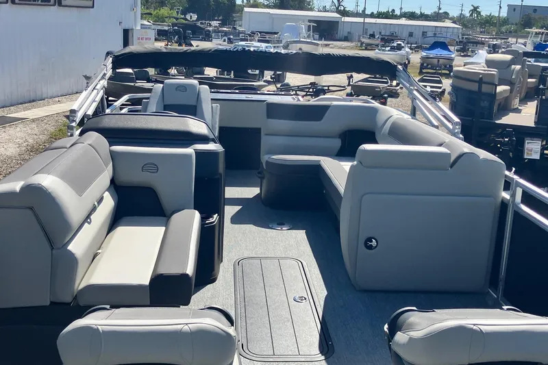 Slide: The Image of 2026 Sun Tracker Fishin' Barge 22 XP3 interior with spacious seating and modern design. - 3