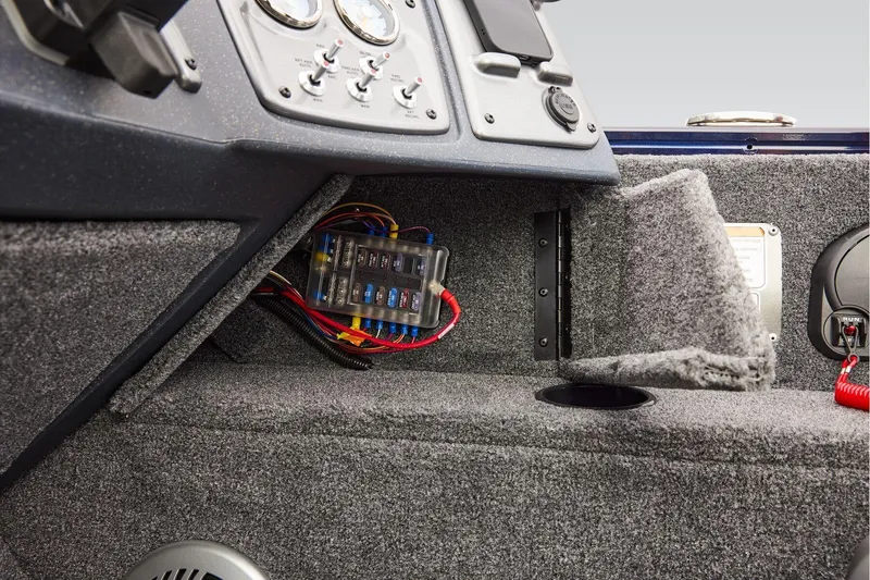 Slide: The Image of 2026 Tracker Pro Guide V-175 WT boat dashboard with storage compartment. - 21