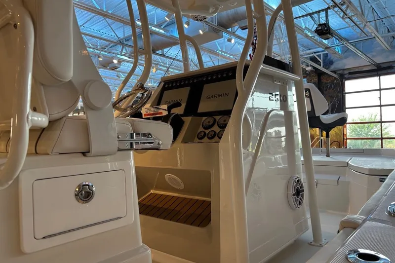 Slide: The Image of 2026 Ranger 2510 Bay boat interior with Garmin navigation system and sleek design. - 4